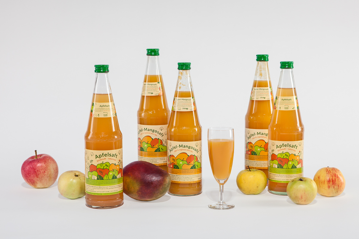 Gestaltung der Etiketten von Apfelmangosaft und Apfelsaft